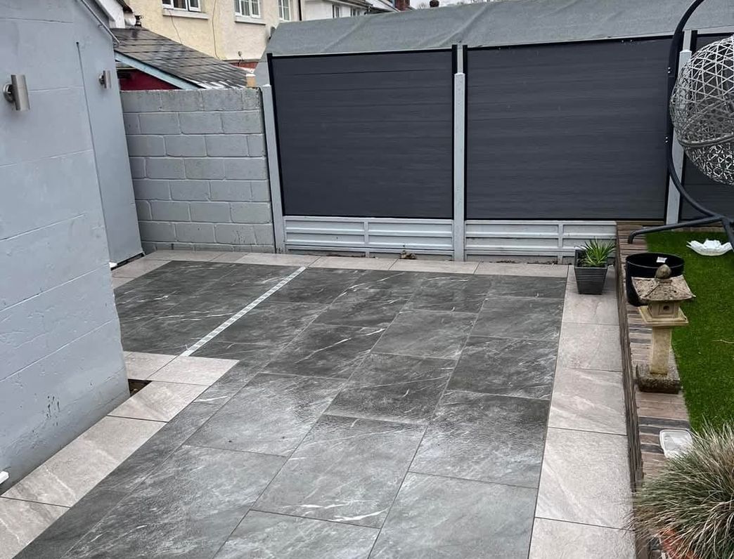 A Clarke's Construction backyard patio and lawn hardscaping project in Andover.